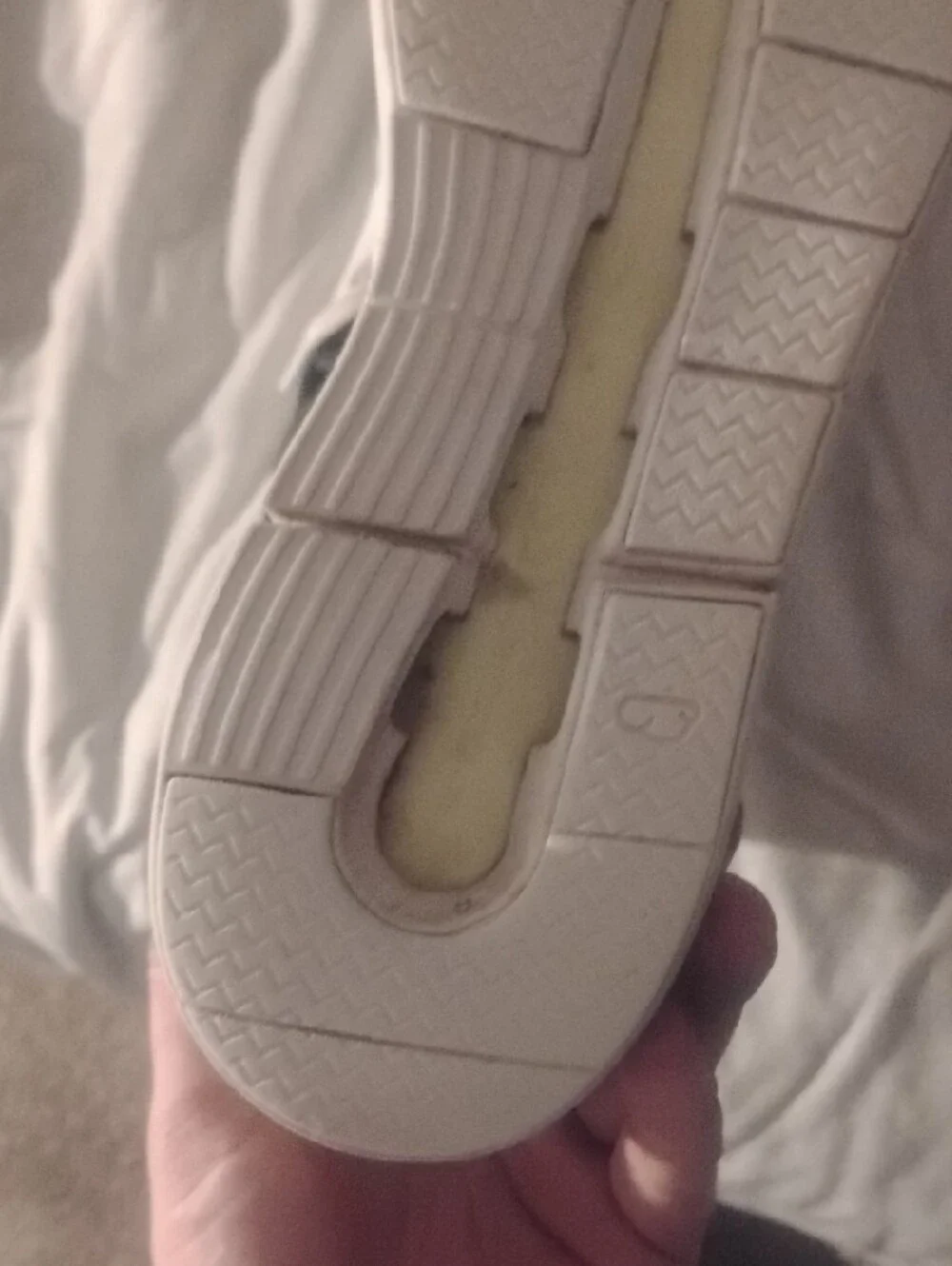 On Running The Roger Navy And White With Yellow Accents Size 11.5